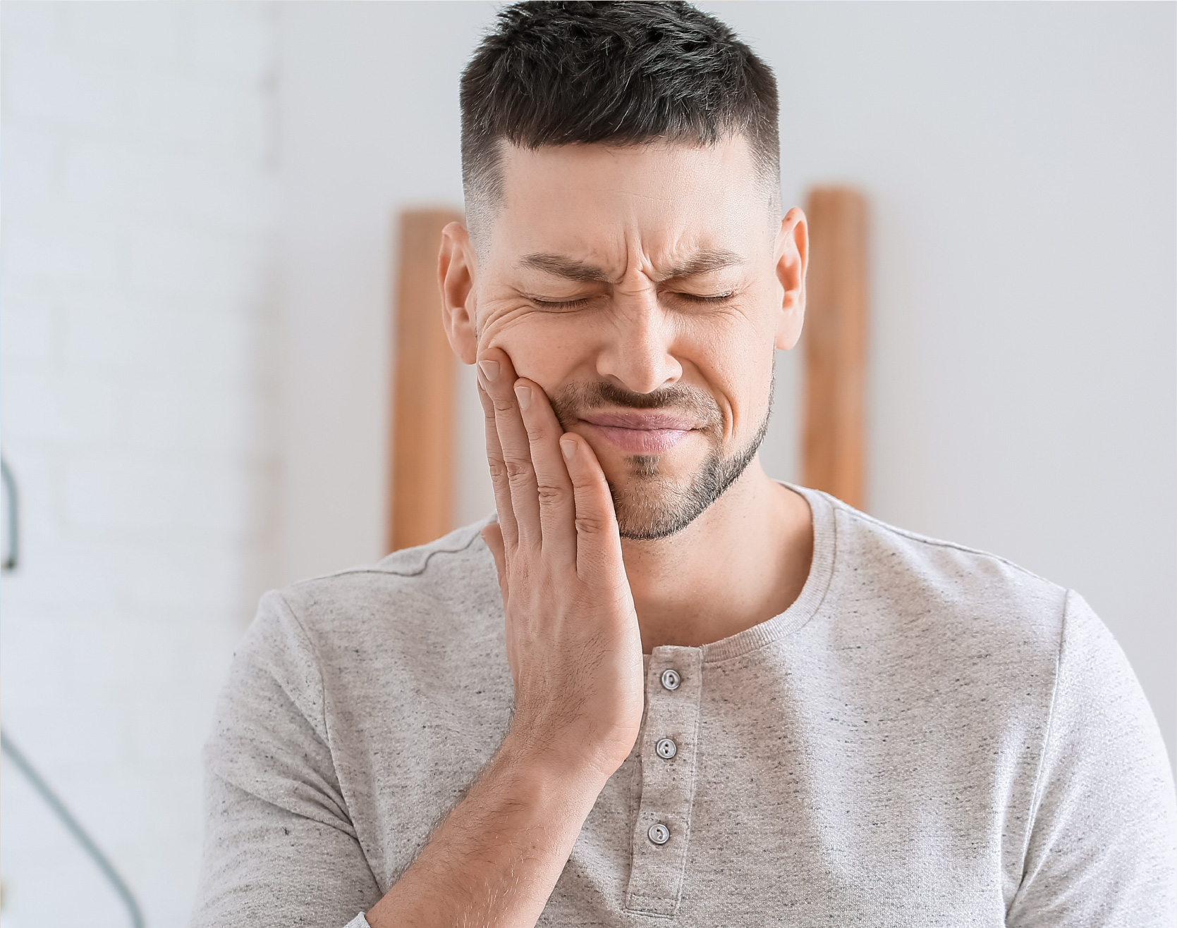 Man experiencing dental pain